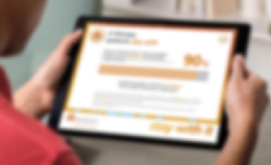 Hands holding a tablet showing evidence data alongside a bar chart